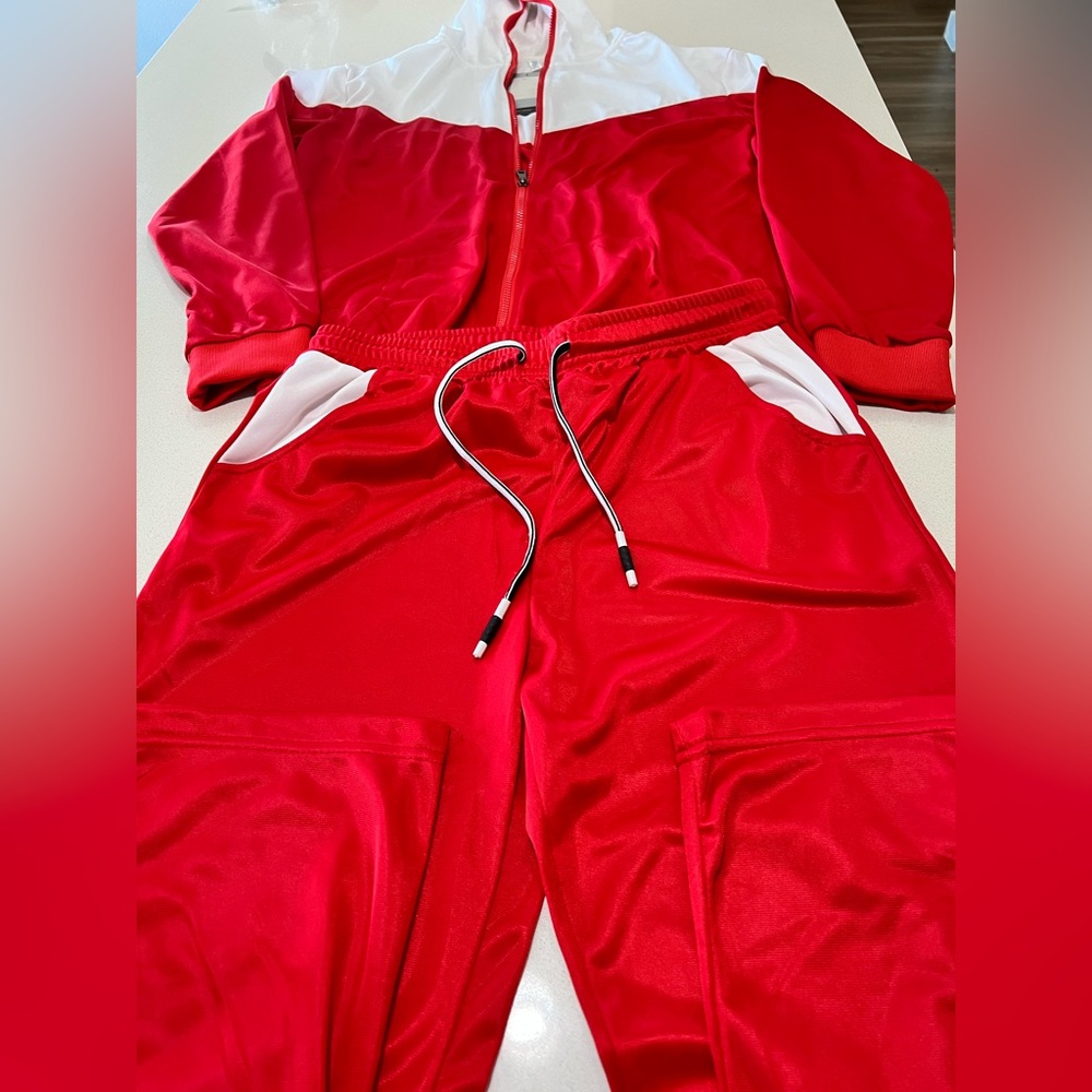 Men’s red and white jogging suit. Size medium. Guaranteed to stand out